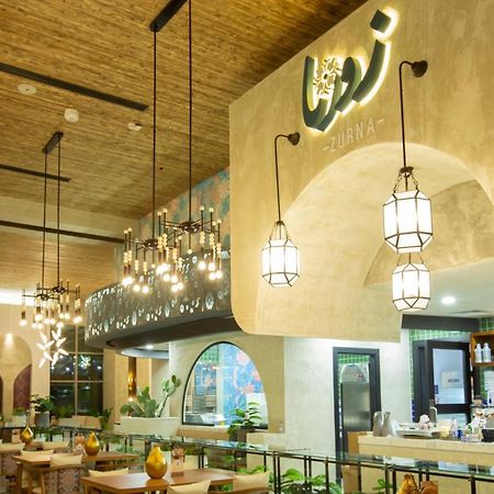 Citadines Abha Aparthotel Exterior foto Interior of the restaurant