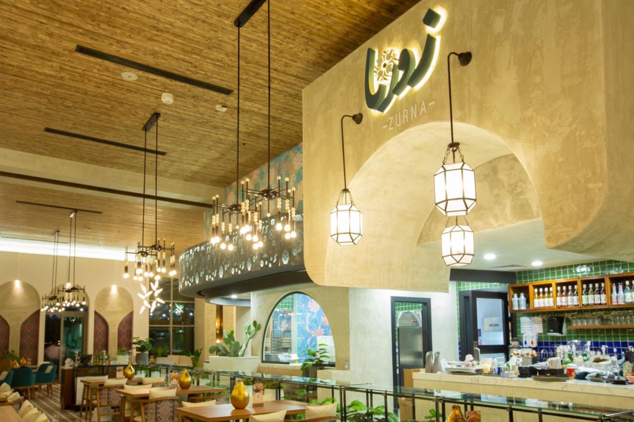 Citadines Abha Aparthotel Exterior foto Interior of the restaurant