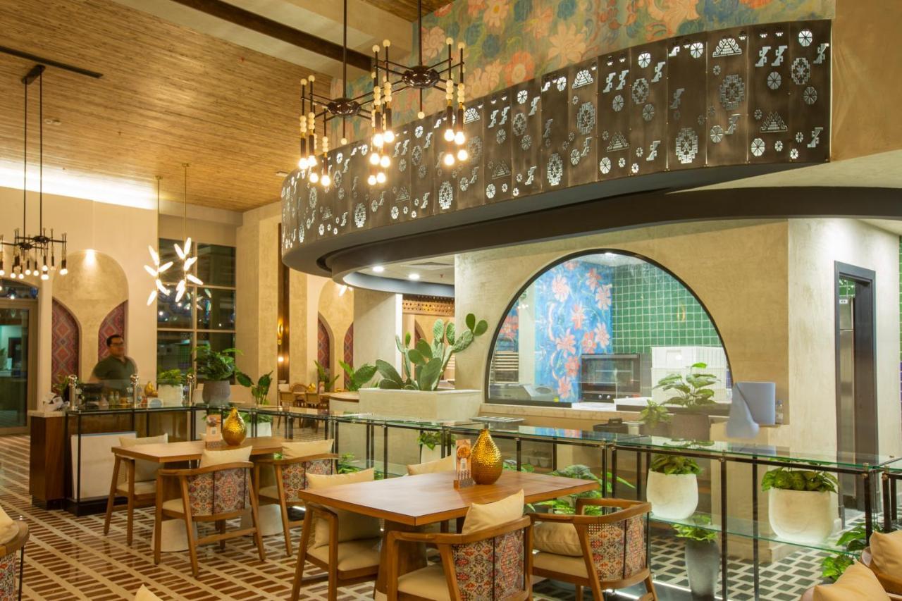 Citadines Abha Aparthotel Exterior foto The interior of the restaurant